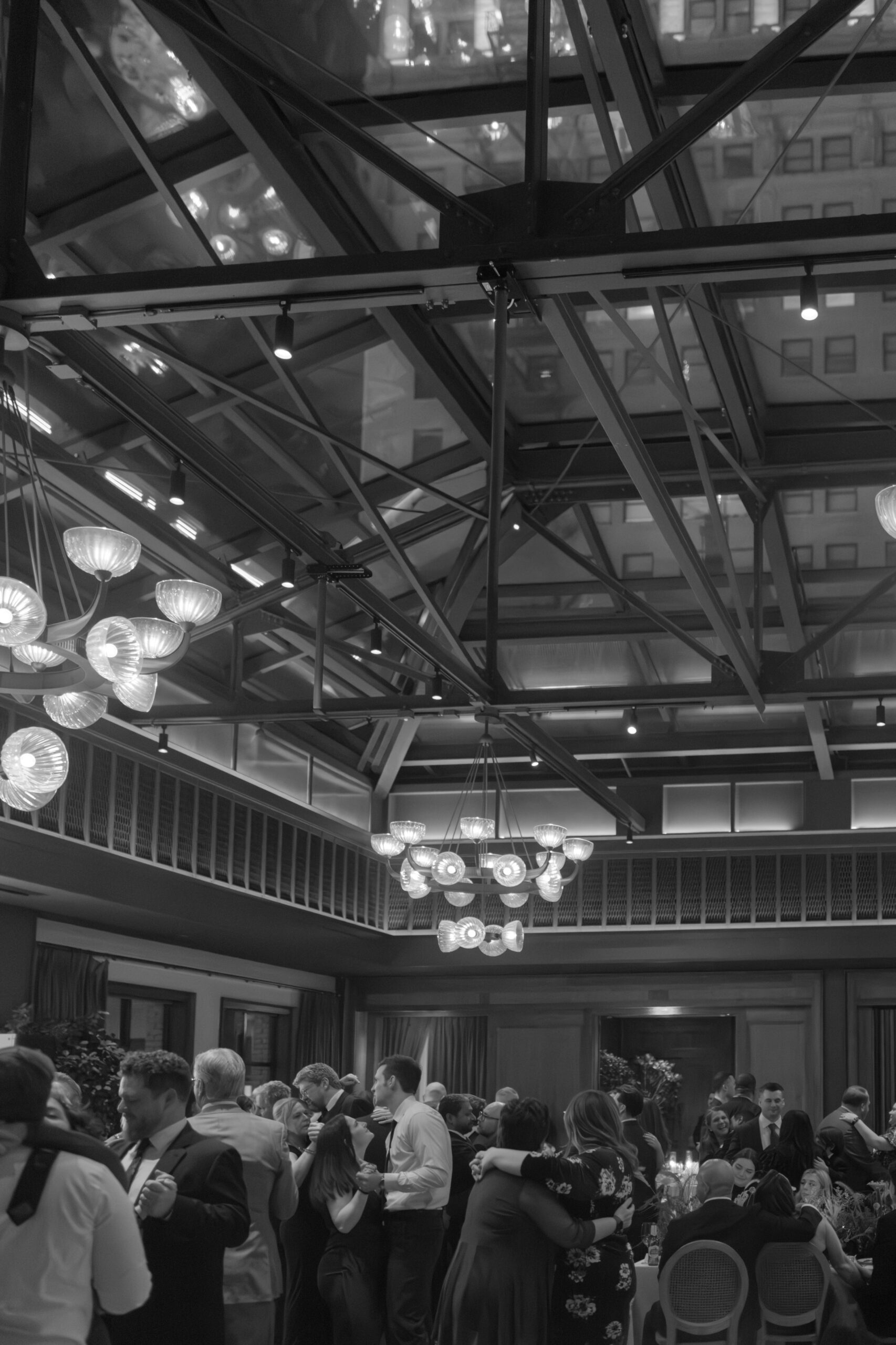 A photo of guests dancing during a wedding reception at the Book Tower in Detroit.