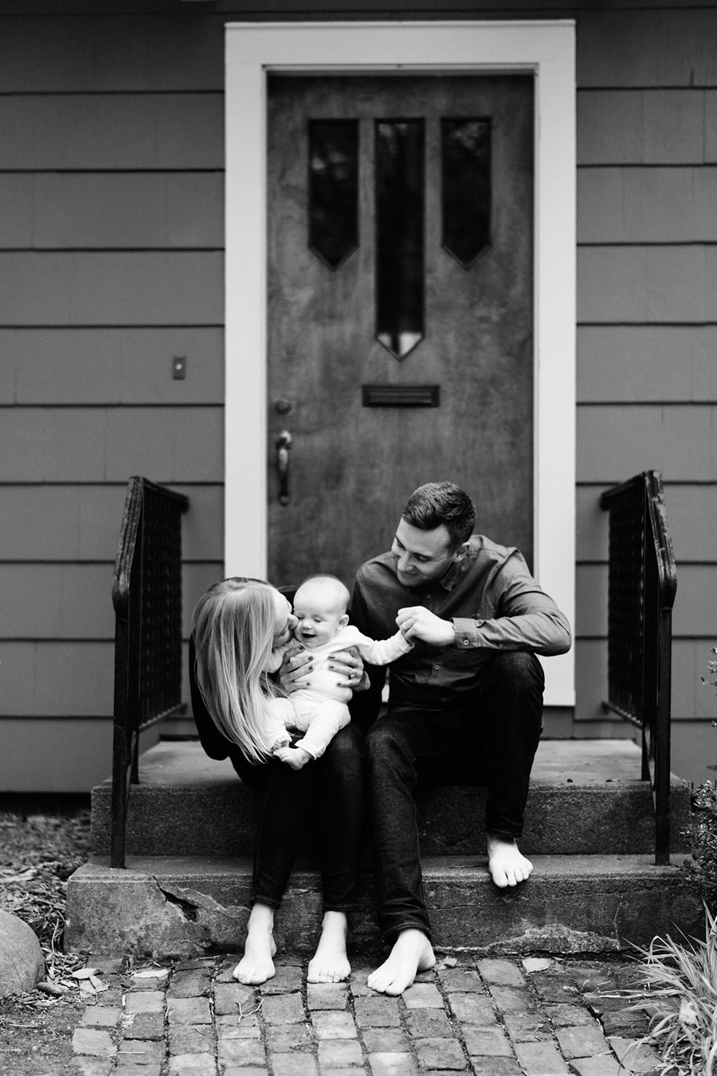 Penny and her humans at home in Ann Arbor