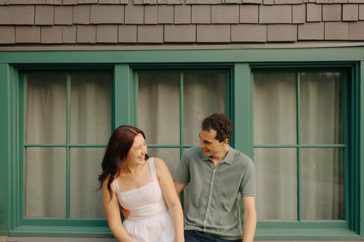 A couple laughing during their mount rainier engagement session.